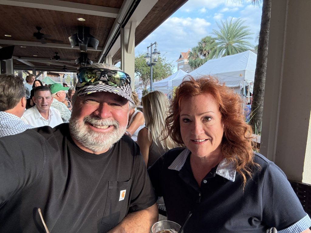 Tammi and Darren Montgomery at Brownwood Paddock Square in the evening, The Villages, Florida